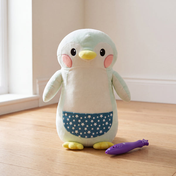 Polly The Penguin Glow Buddy plush with its purple light pen