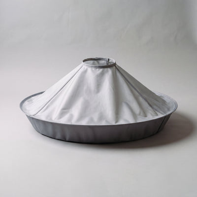 The Hair Catcher Cutting Cape, silver-grey with a darker grey groove wall