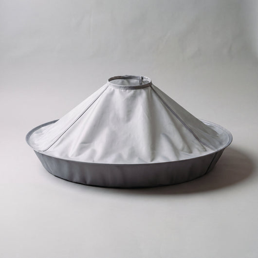 The Hair Catcher Cutting Cape, silver-grey with a darker grey groove wall