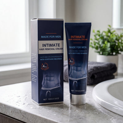 Men's hair removal cream tube and carton on a bathroom counter
