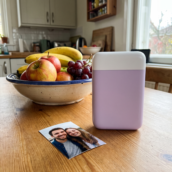 Novum Pocket Sticker Photo Printer on a kitchen table