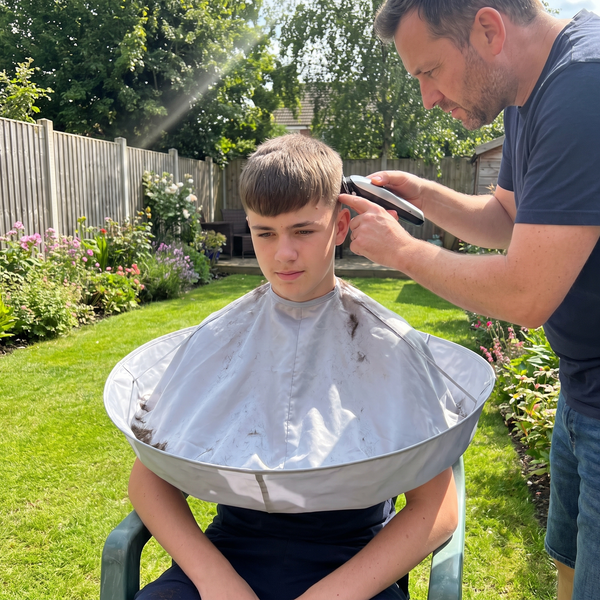 Garden haircut with the Hair Catcher Cutting Cape
